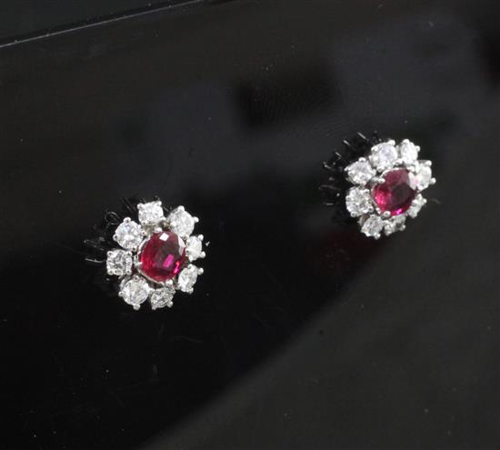 A pair of white gold ruby and diamond cluster ear studs, 10mm.